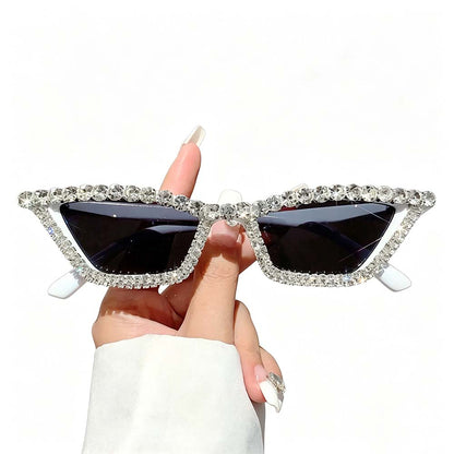 White rhinestone cat eye sunglasses with dark lenses