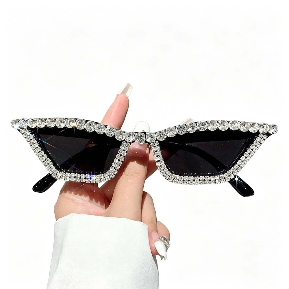 Black rhinestone cat eye sunglasses with dark lenses